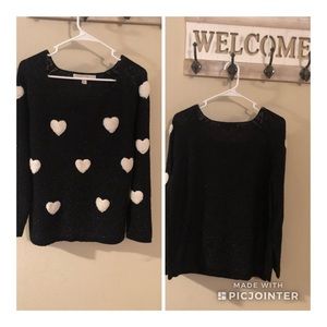 Cute heart sweater.